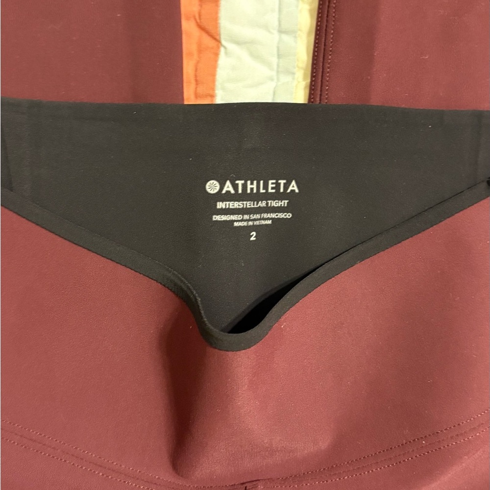 Athleta Interstellar Tight Kick Flare Maroon Pant - Picture 4 of 5
